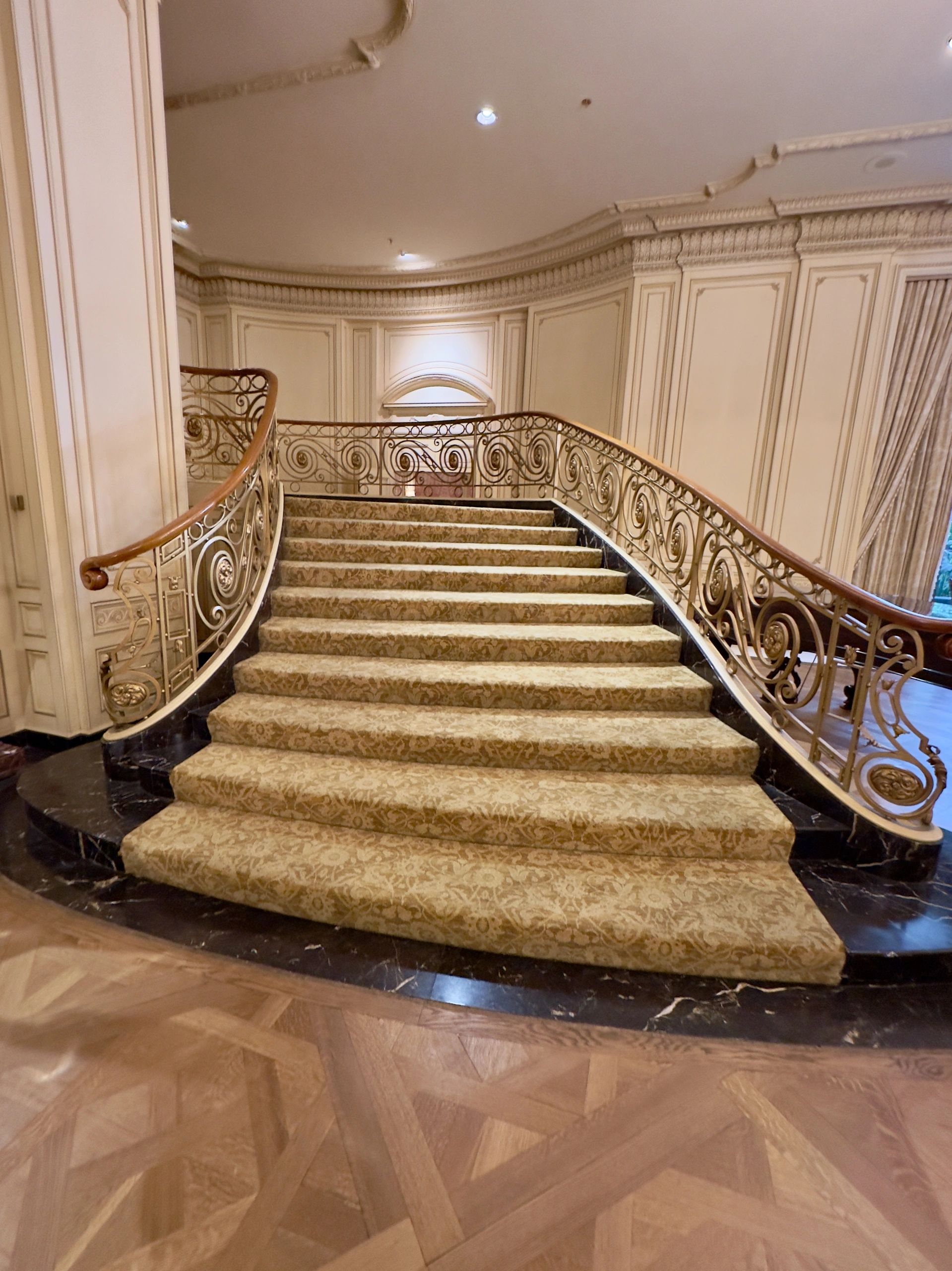 Ornate staircase with classic architectural detailing